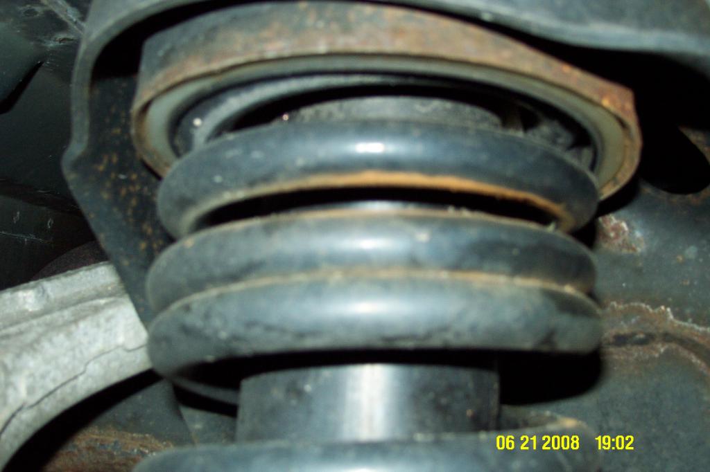Broken coil spring 2003 ford taurus