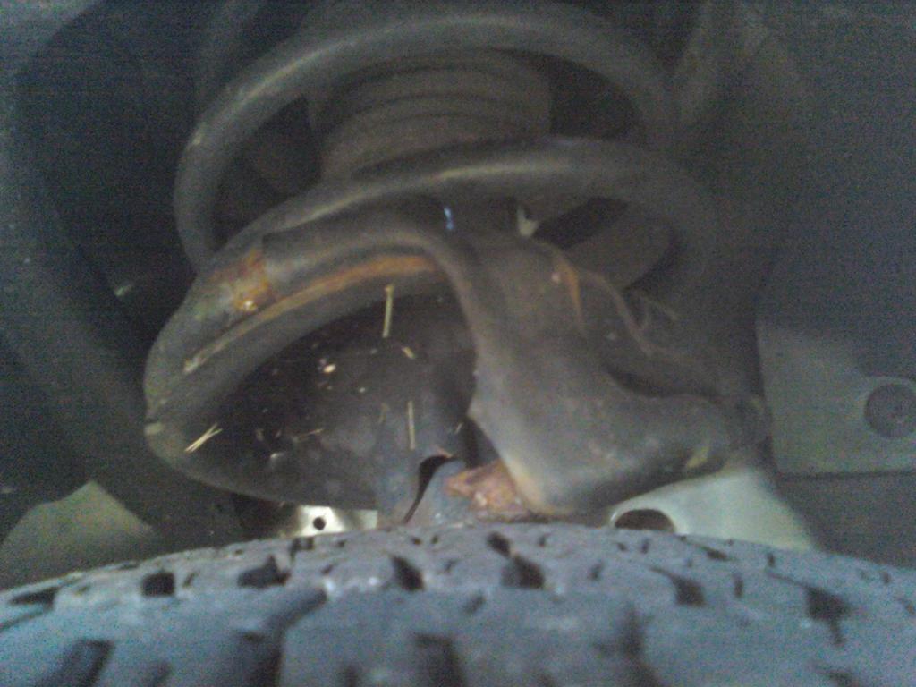 Broken coil spring 2003 ford taurus #7